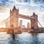 Tower Bridge in London, the UK at sunset. Drawbridge opening