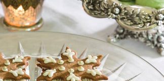 Snowflake Sandwich Cookies with Eggnog Spice Filling