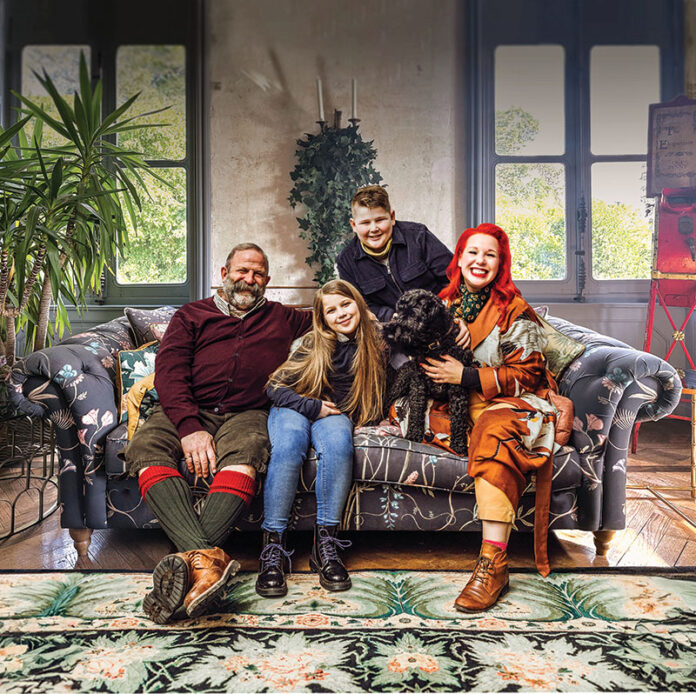 Angel and Dick Strawbridge, along with their children, Arthur and Dorothy, at home in their château’s salon.