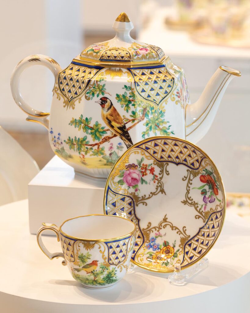 Teapot, cup, and saucer from a larger set by Herend FRA Frankental, Hungary, circa 20th century.