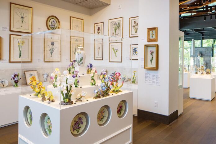 The iris, Deen Day Sanders’s favorite flower, is highlighted in porcelain and other mediums.