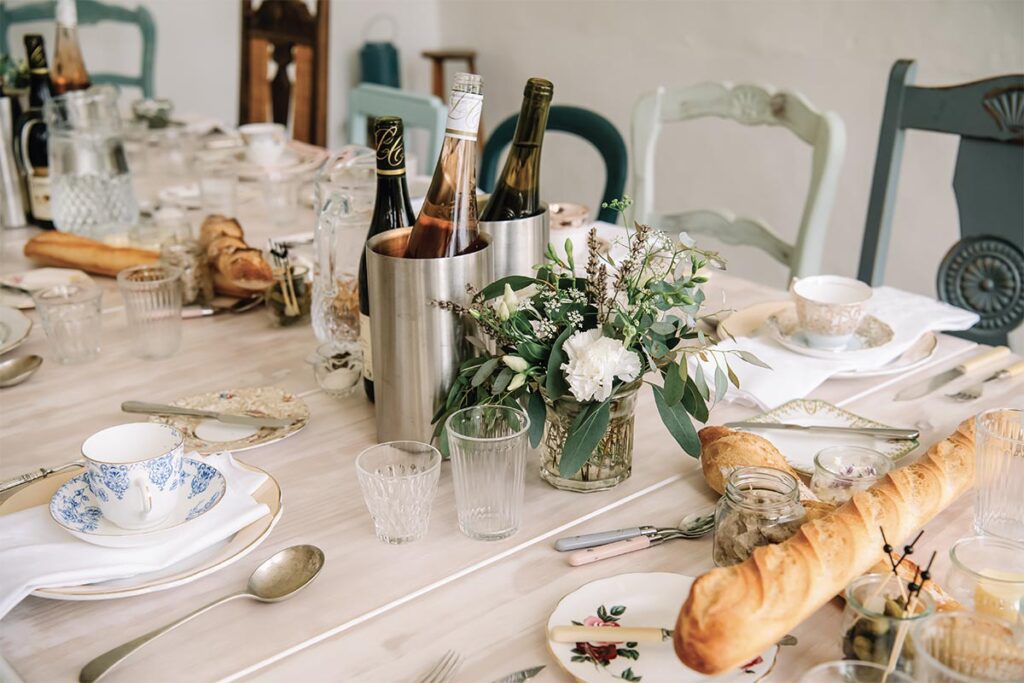 A table set up for a celebration in the orangery. Photograph by Marie Marry Me