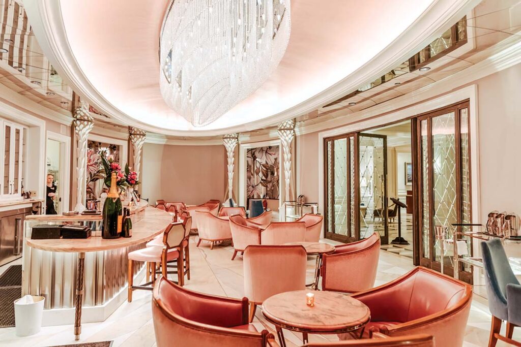 The chic pink tea parlor at Camellias exudes feminine appeal and sophisticated luxury in every detail.