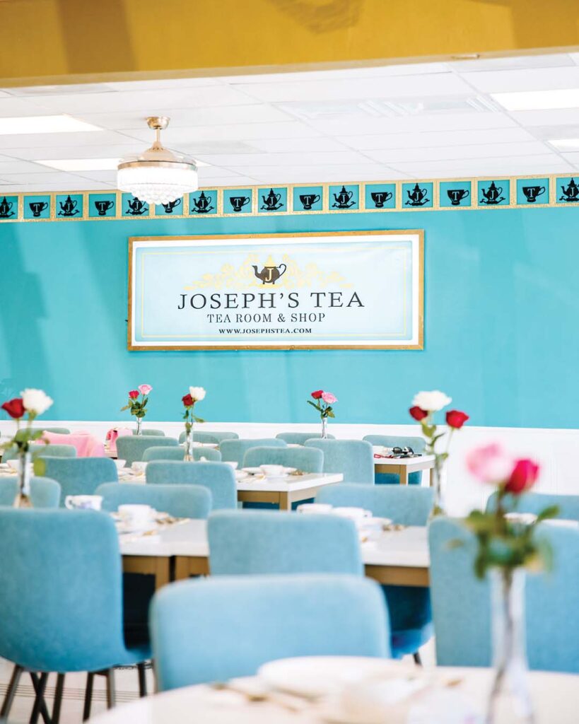 Tea, adorned with blue walls and modern accents, is a beautiful place in which to enjoy teatime. Photograph by Honeybee Memory Photography