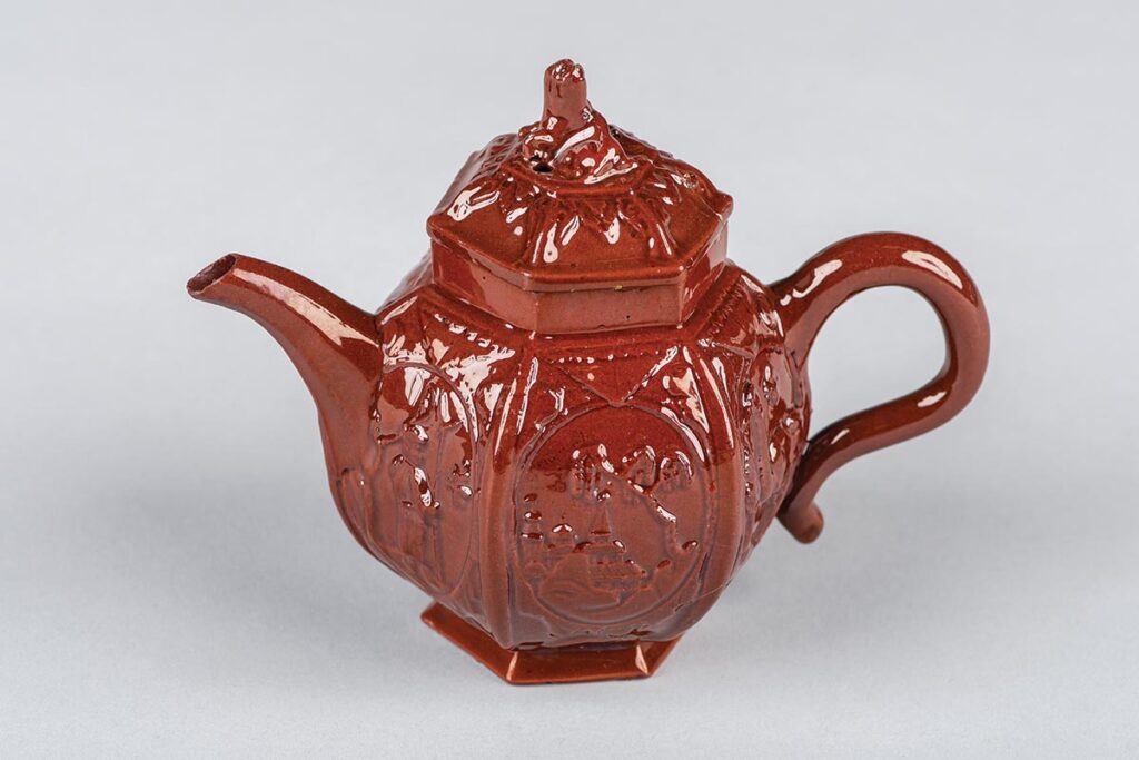 Moulded earthenware teapot in Yixing style, possibly by Samuel Bell, Staffordshire.