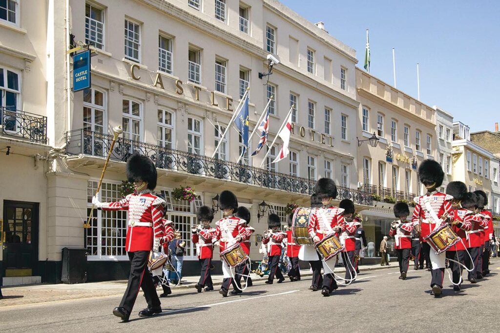 Changing the Guard at Windsor Castle is accompanied by the Guards Band on scheduled days of each month. Photograph Courtesy of The Castle Hotel