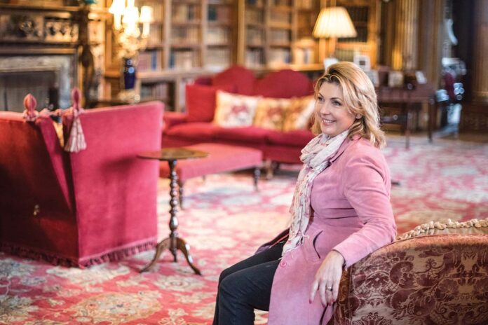 Lady Fiona is pictured in the library at Highclere where many scenes of Downton Abbey were filmed. Photograph Courtesy of Highclere Castle.