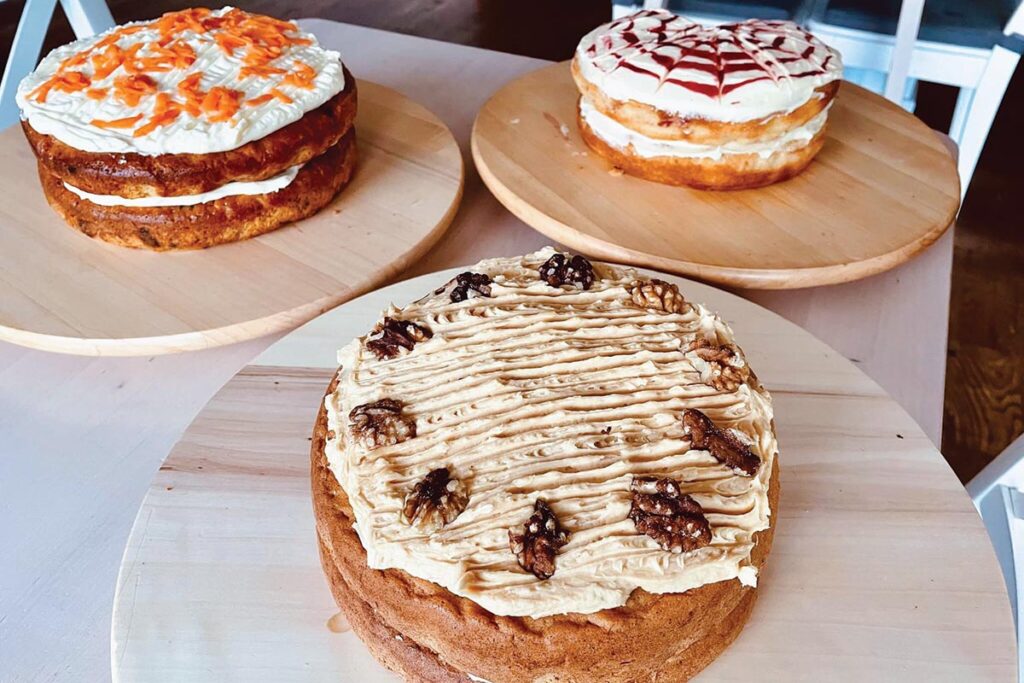 Louie’s homemade cakes are delicious. The carrot cake, top left, has been called “the best ever” by regular customers. Photograph Courtesy of Louie’s Coffee & Teahouse