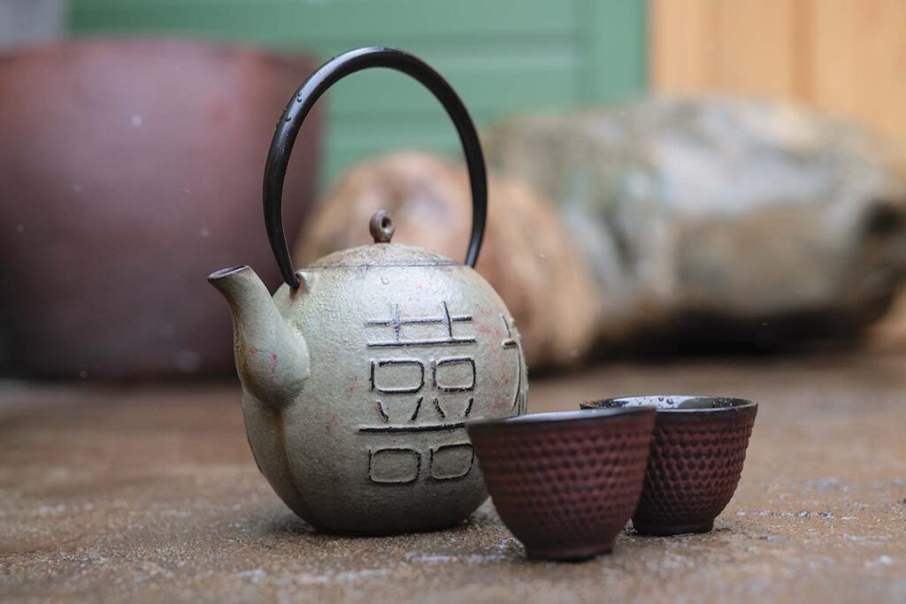 Traditional Japanese teaware is used.