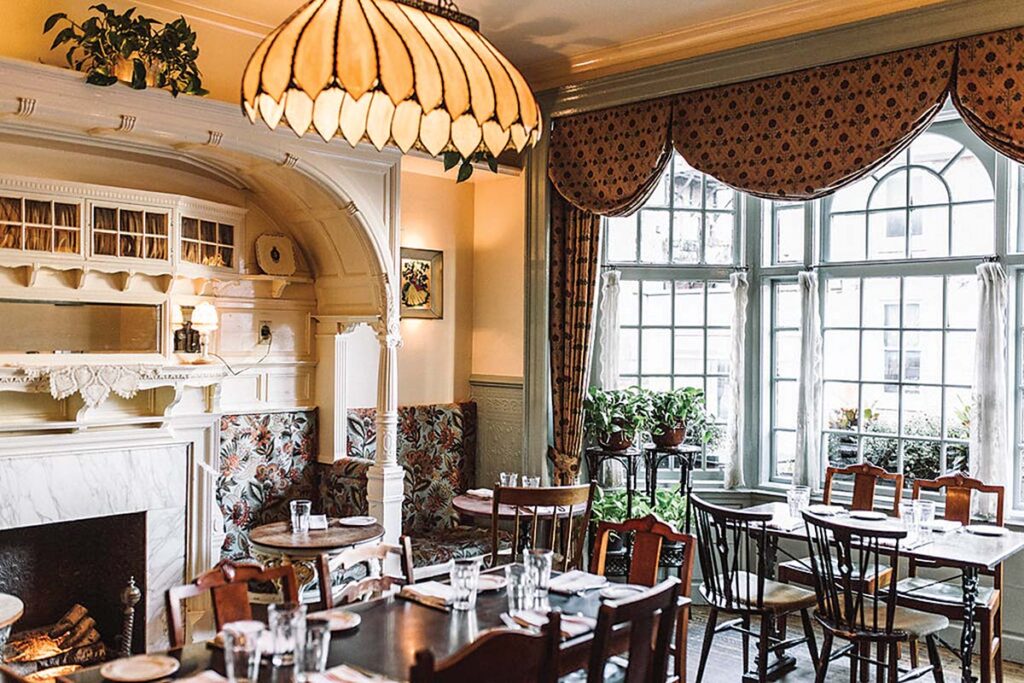 The beautiful Victorian-style dining room exudes a sense of home away from home.